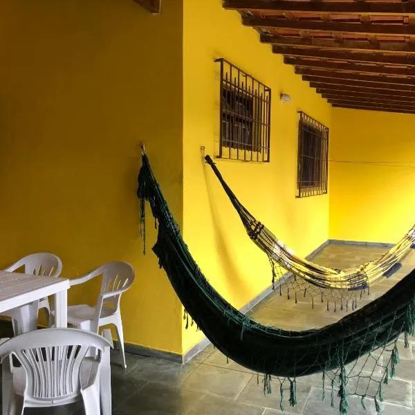 Casa em frente à praia Boracéia，位于朱奎的酒店