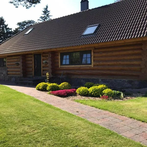 The gorgeous log house, that brings out the smile!，位于Nõmmeveski的酒店