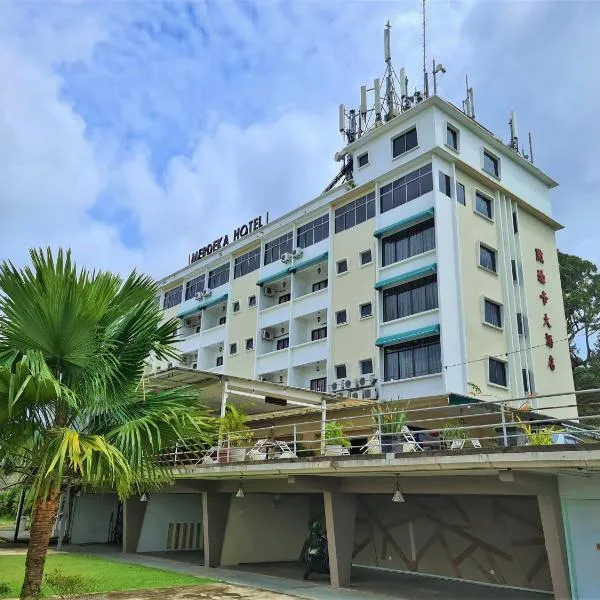 默迪卡居銮酒店，位于Air Hitam的酒店