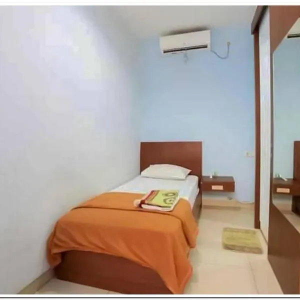 The Nancy's Homestay Pekanbaru Mitra RedDoorz，位于北干巴鲁的酒店