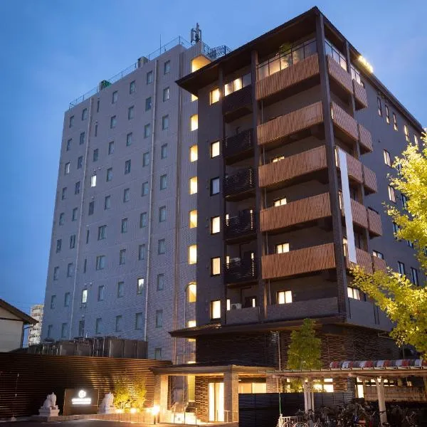 武雄艾克麦中心酒店，位于武雄市的酒店