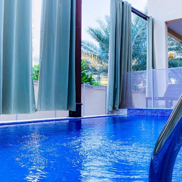 Mina Al Fajer Villas，位于迪巴的酒店
