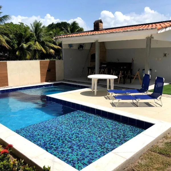 Casa completa com piscina e área de laser completa na praia BELA - PB，位于Pontinhas的酒店