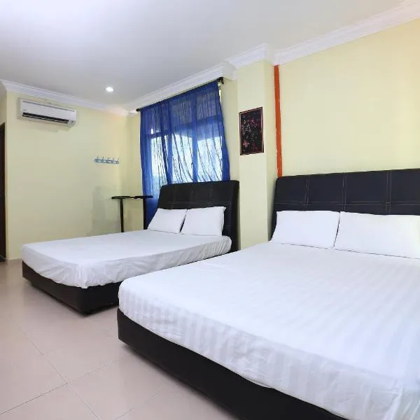 SPOT ON 89857 Azra Inn (rumah Tumpangan)，位于Kampong Gong Merbau的酒店