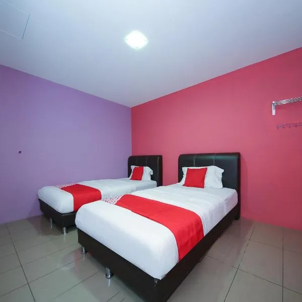 Super OYO 89650 Inn Hotel，位于Kampong Sungai Kerawai的酒店