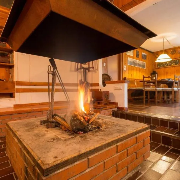 La Casa di Michela - 120m2 in the mountains with fireplace & garden，位于Strigno的酒店