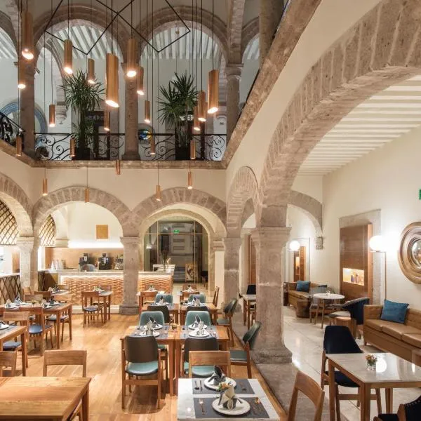 Hotel Herencia By Hosting House，位于莫雷利亚的酒店