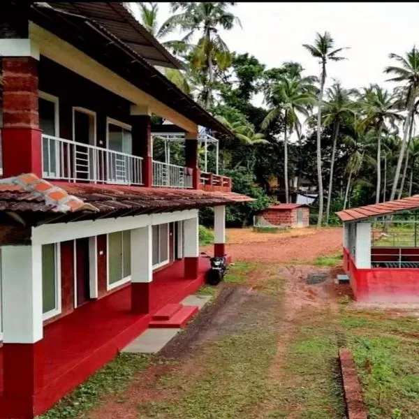 kannur west beach homestay，位于Mulappilangād的酒店