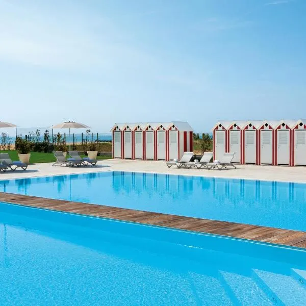 亚得里亚海皇宫酒店，位于利多迪耶索罗的酒店