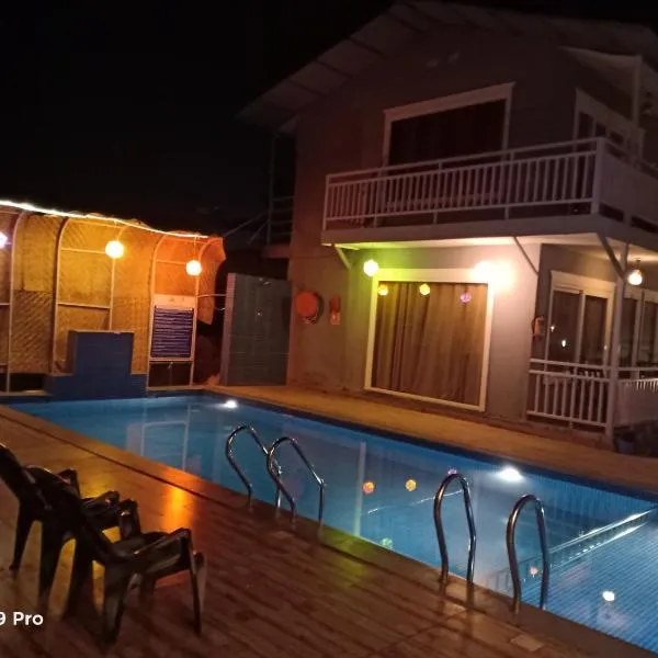Sea Shell Beach Cottages & Suites，位于阿姆波尔的酒店