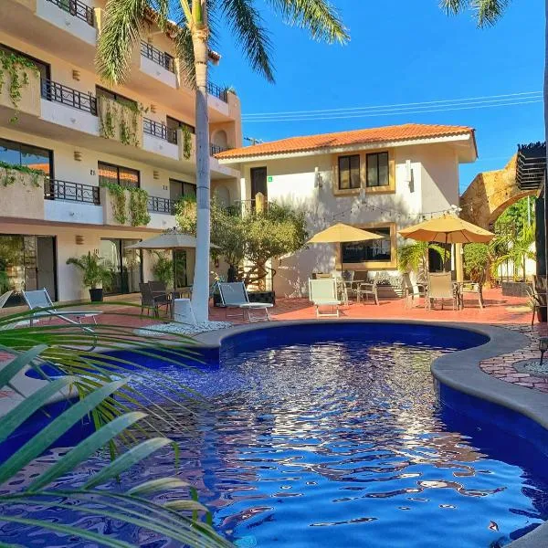圣达菲洛斯卡沃斯别墅群酒店，位于Los Verdes的酒店