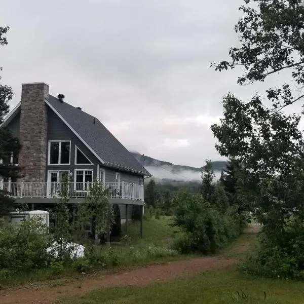 Condo-chalet de la Vallée d'Édouard，位于Riviere Eternite的酒店