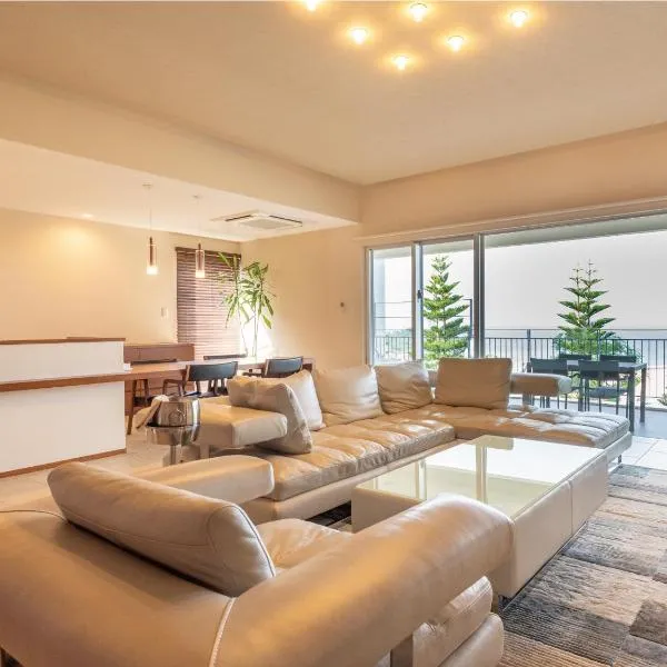 Condominium T-Room，位于吉马的酒店