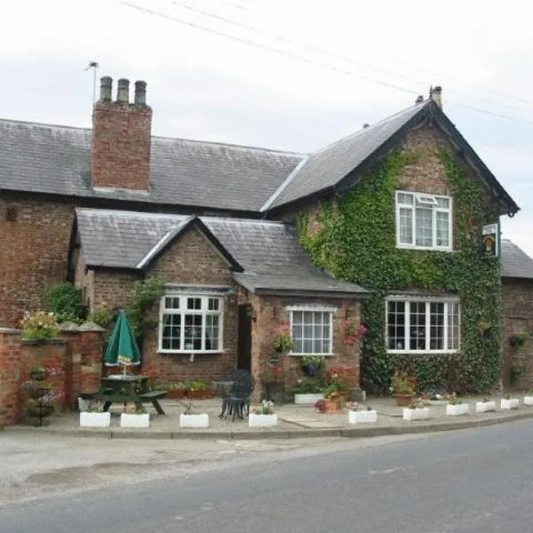 汤普森纹章酒店，位于Sutton on the Forest的酒店