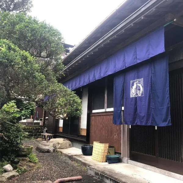 ゲストハウス Rei，位于本宫的酒店