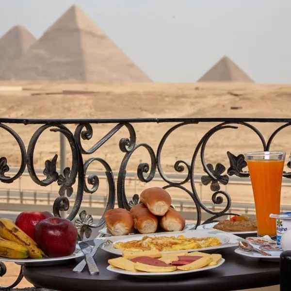 Pyramids Planet Hotel，位于开罗的酒店