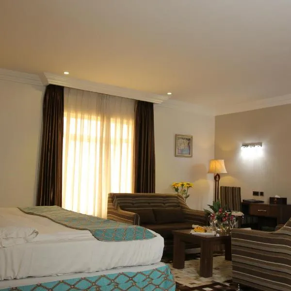 大培拉套房酒店，位于阿布贾的酒店