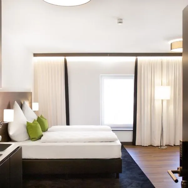 KU Hotel by WMM Hotels，位于库姆巴赫的酒店