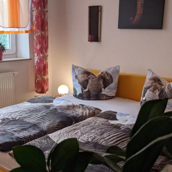 Pension Café & mehr，位于萨勒河畔哈雷的酒店