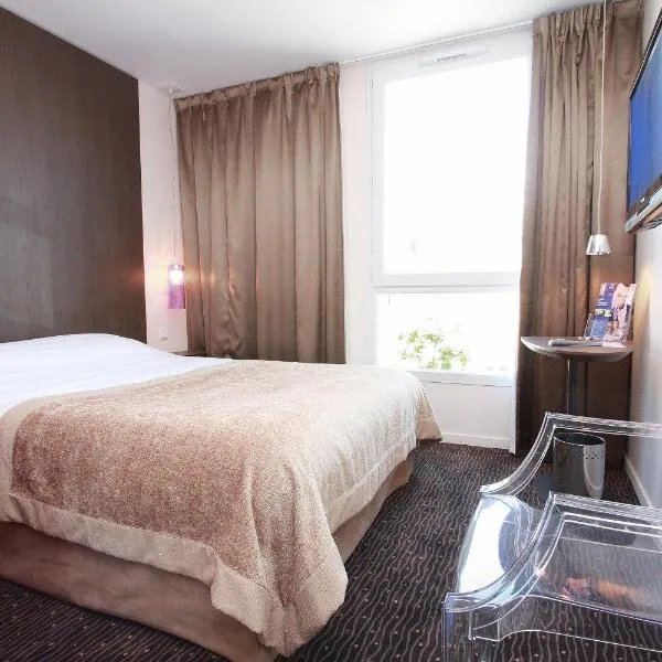 基里亚德查尔勒维勒梅兹尔酒店，位于沙勒维尔-梅济耶尔的酒店