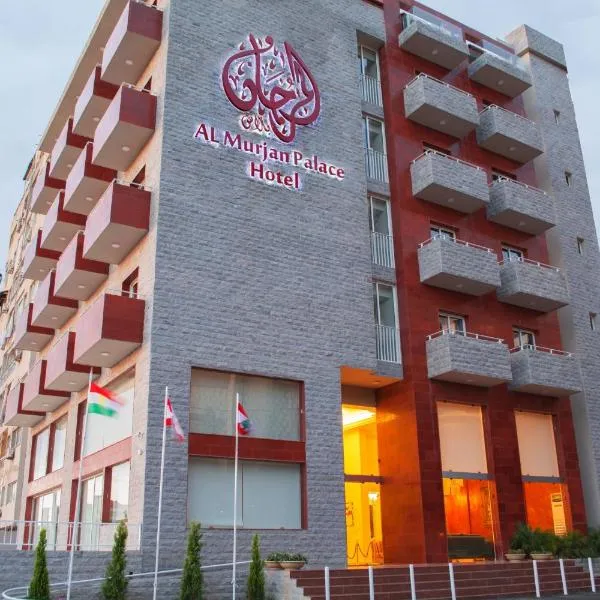 阿尔木间朱尼耶皇宫酒店，位于Admā的酒店