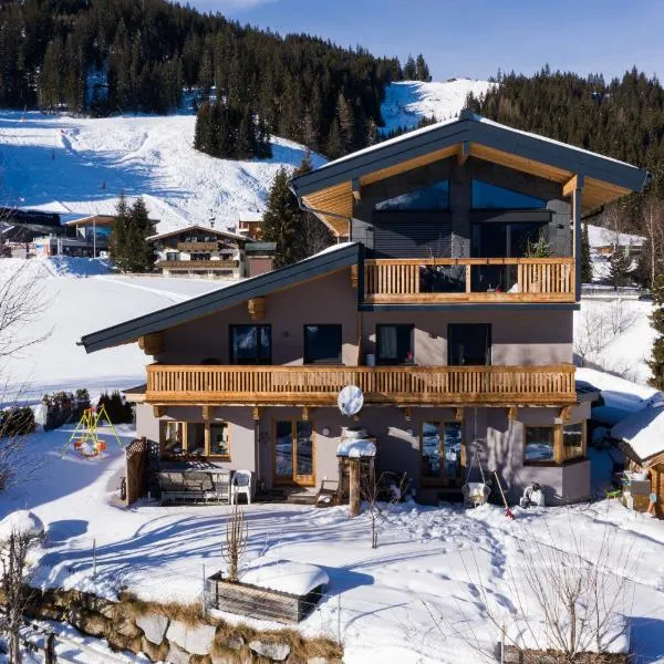 Ski in - Ski out Panoramaferienhaus Breitmoos neben Mittelstation，位于米特西尔的酒店