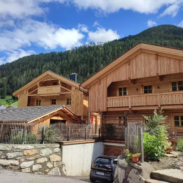 Schlosswirt Chalets & Apartments，位于大基希海姆的酒店