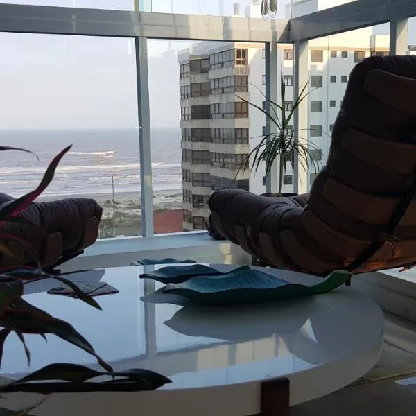 Em Capao da Canoa - Luxo e conforto com praia , sol e mar em Capão.，位于卡庞达卡诺阿的酒店