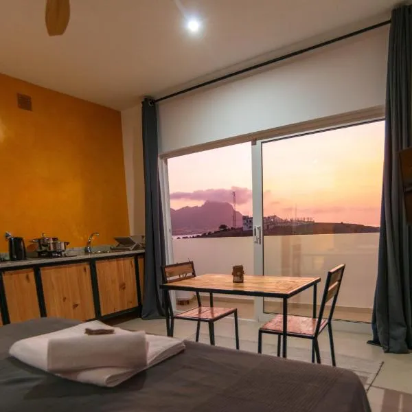Apartamento Zinha Amwilla Guesthouse，位于明德卢的酒店