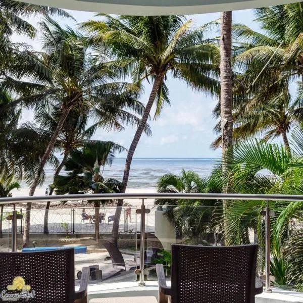 Rosy Sea Front Beach Condo，位于班布里的酒店