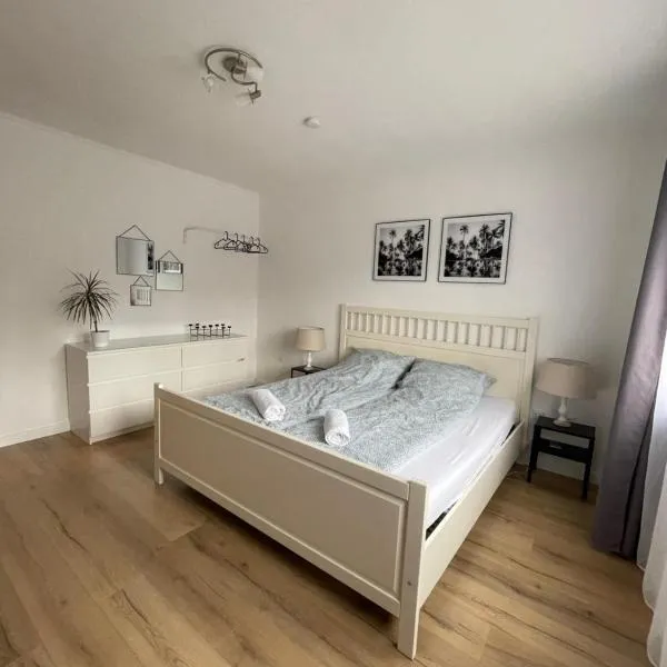 Moderne, helle Wohnung mit Terasse 15min bis OB Centro，位于丁斯拉肯的酒店