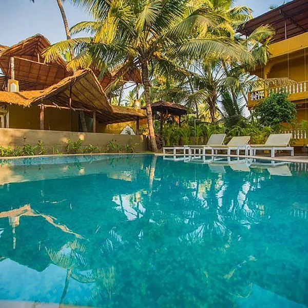 juSTa Morjim Beach Resort Goa - 80 Steps from Morjim Beach，位于莫尔吉姆的酒店