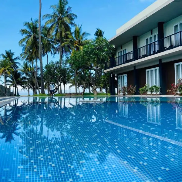 金色星海滩酒店，位于Andiambalam Walpola的酒店