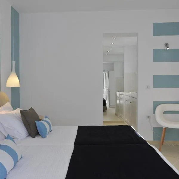 浪漫套房公寓式酒店，位于纳乌萨的酒店