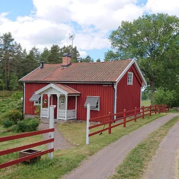 Året runt i väldigt härlig natur Bo på lantgård，位于Sanda的酒店