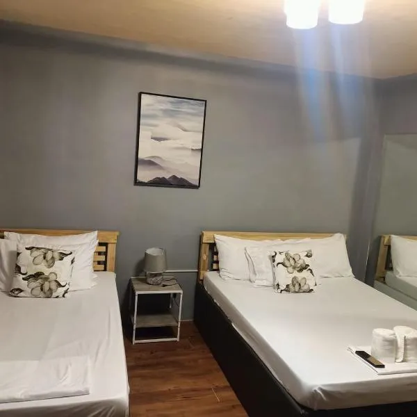 DJCI Apartelle Walk to Robinson & NE Pacific Mall 3 Min to SM Cabanatuan，位于甲万那端的酒店