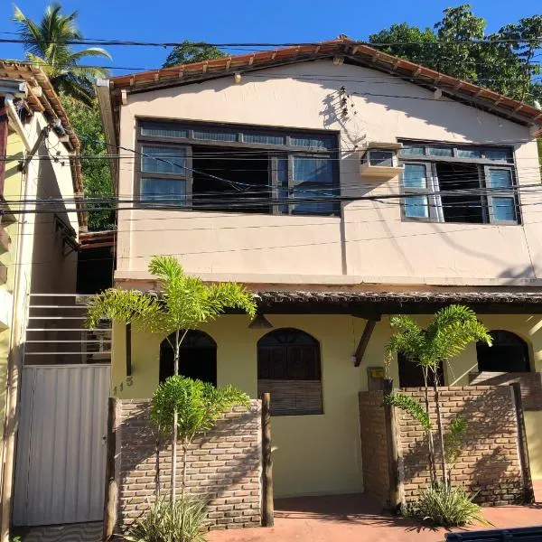 Casa no centro da cidade com garagem.，位于伊塔卡雷的酒店