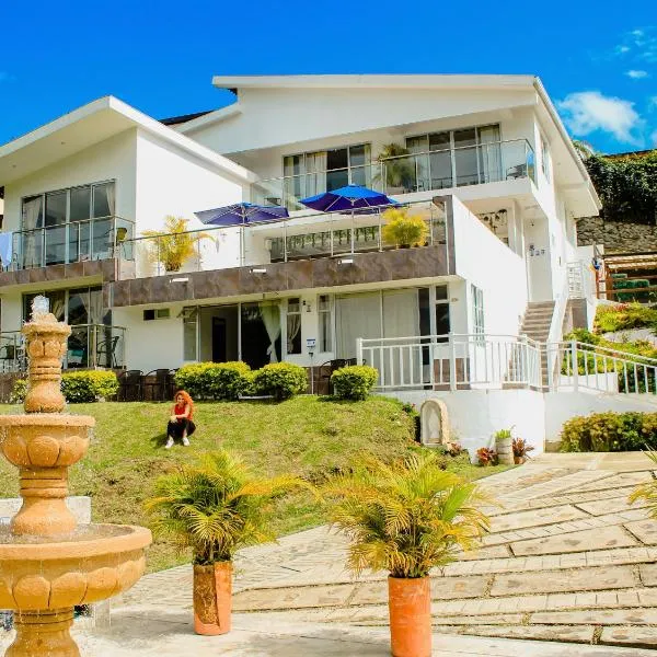 Hotel Boutique Palmas de Salento，位于萨兰托的酒店