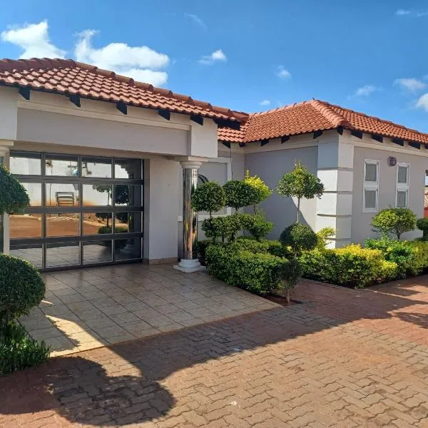 Kingdoms Place Guesthouse，位于Boshoek的酒店