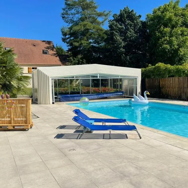 L'Annexe- guest house avec piscine studio avec coin chambre，位于Rosny-sur-Seine的酒店