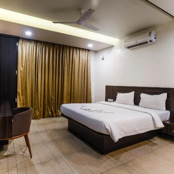 Hotel Manasi INN，位于Mandwa的酒店