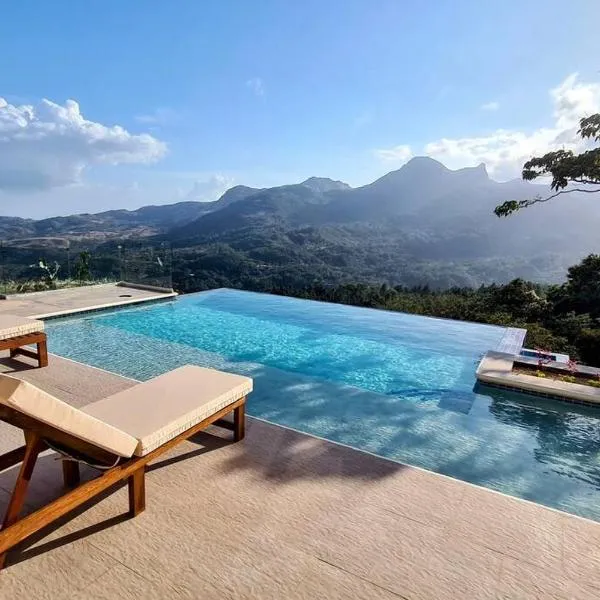 Cabaña con Espectacular Vista y Piscina Climatizada，位于查梅的酒店