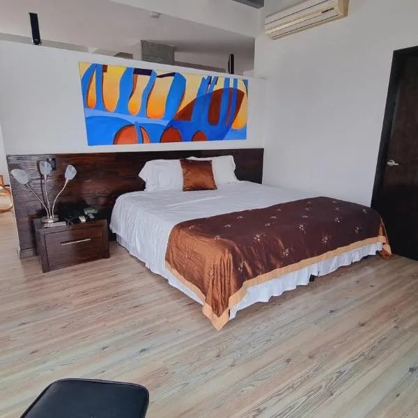 Habitat Suites Hotel By GHO Hoteles，位于佩雷拉的酒店