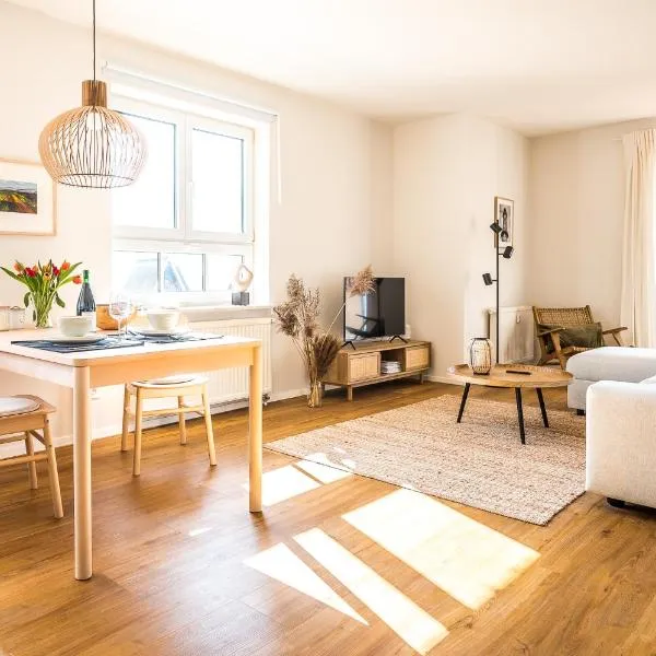 Wunderschöne Ferienwohnung mit Feldblick und Balkon, mit kostenlosem Wlan und Strandfahrrad, Haustiere erlaubt，位于伯尔格伦德-雷特维施的酒店