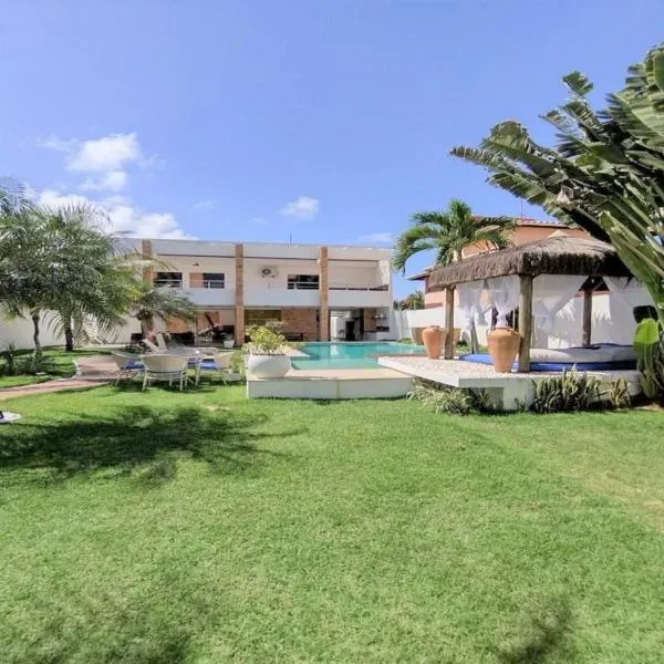 Maravilhosa casa de praia,cama balinesa，位于伊比拉奎拉的酒店