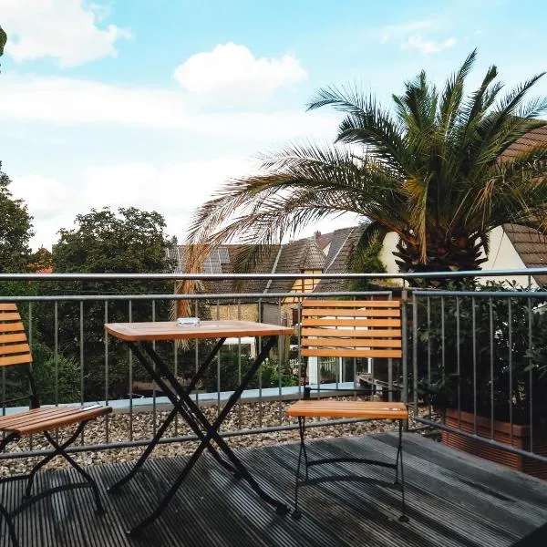 瓦塞韦恩酒店，位于莱茵河畔因格尔海姆的酒店