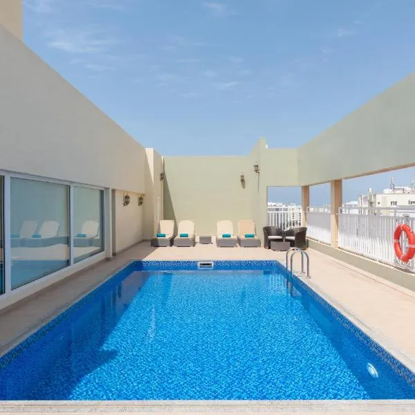 Centara Life Muscat Dunes Hotel，位于Al Amarat的酒店