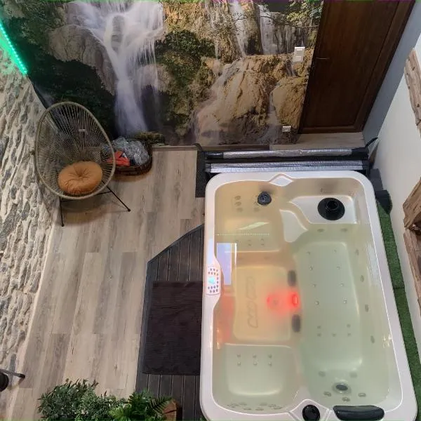 Petite maison chaleureuse avec jacuzzi privatif，位于Barain的酒店