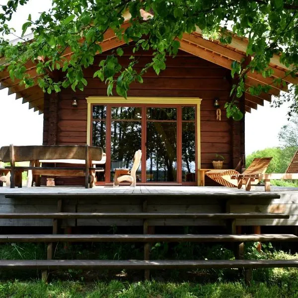 Kaimukas - namelis prie ežero keturiems，位于Akmuo的酒店