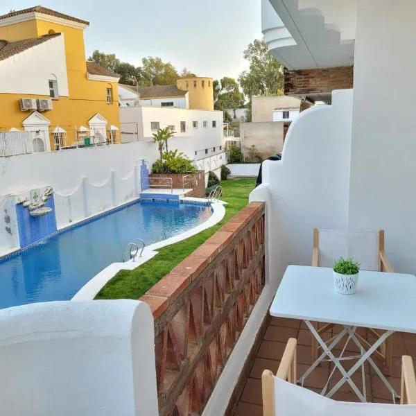 Apartamento en Rota con piscina y parking junto al mar，位于Almadraba的酒店